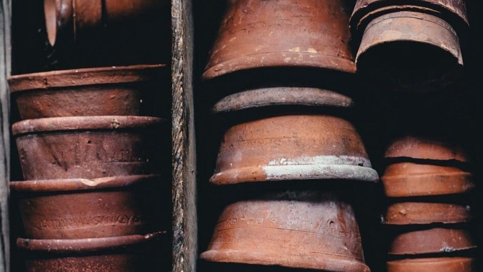 closeup stack of brown clay pot lot