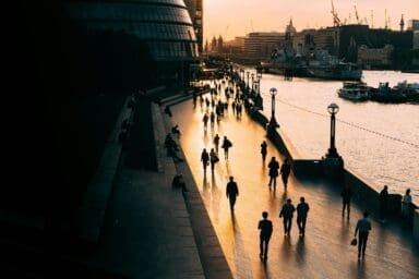 People walking in London in the early evening