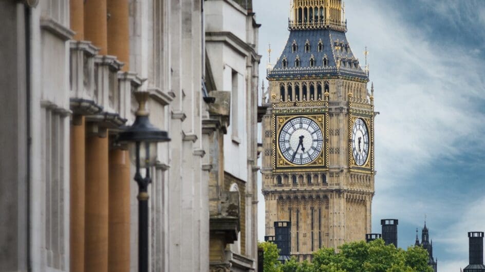 the big ben clock tower towering over the city of london