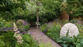 Horatio's Garden. Designed by Charlotte Harris and Hugo Bugg. Sponsored by Horatio's Garden and Project Giving Back. Show Garden. RHS Chelsea Flower Show 2023.