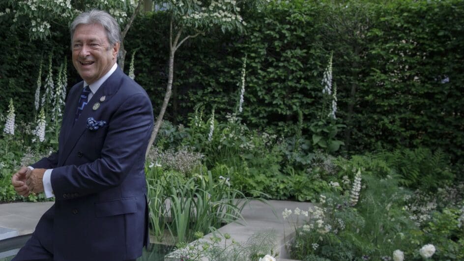 Celebrity gardener Alan Titchmarch (R) joins the Stringfever Quartet as they play on the 'Perennial Garden With Love' show garden, designed by Richard Miers, during press day at RHS Chelsea Flower Show 2022, Monday May 23, 2022.