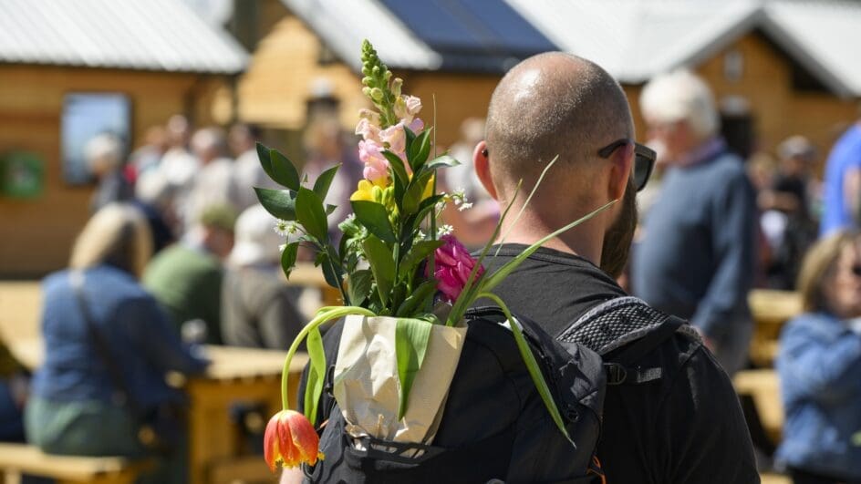 BBC Gardeners' World Visitor with plants in his rucksack