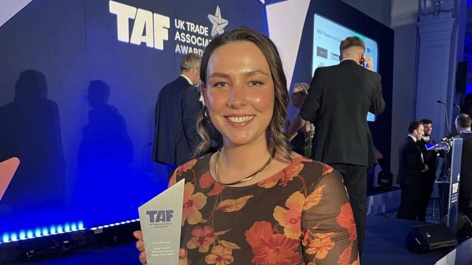 HTA's Katie Keenan winning an award at the UK Trade Association Awards