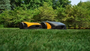 Stiga autonomous robot mowers on the lawn for promotional shoot