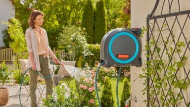 Gardena Dual Hose Box being used by a gardener