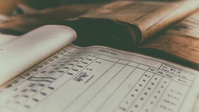 Old record books open for readers to see w