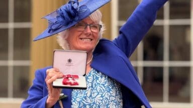 Gill Hodgson receiving her MBE