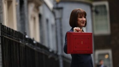 Chancellor with red briefcase