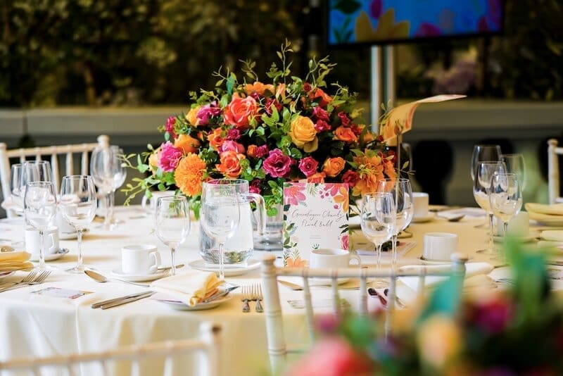 Flowers on a table set for a ball