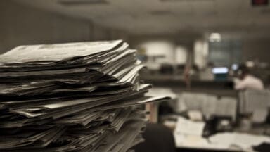 Pile of newspapers at a printers