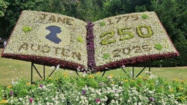 Jane Austin floral display shaped like a book in Parade Gardens Bath