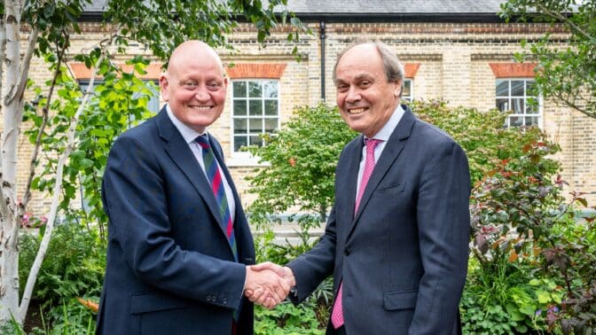 National Garden Scheme Chief Executive, George Plumptre shaking hands with the ABF Chief Executive, Major General (Ret’d) Tim Hyams