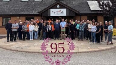 Wyevale Nurseries staff standing infront of their office